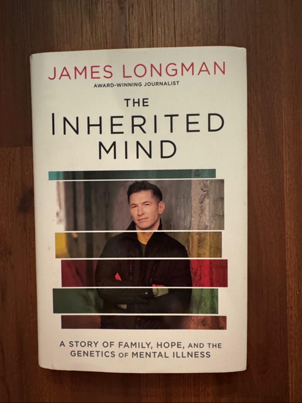 The Inherited Mind by James Longman - White Cover with Multicolor Accents